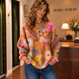 Faustine - Orange Jumper with Colourful Floral Pattern