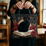 Black Cat on Books Quilted Tote Bag – quilted tote bag by Moira Dublin